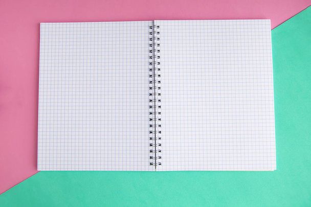 Open mockup notepad on color background, copy space for the text - Photo, image