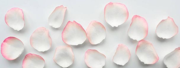 Rose petals on wooden background. Valentines Day background - Photo, Image