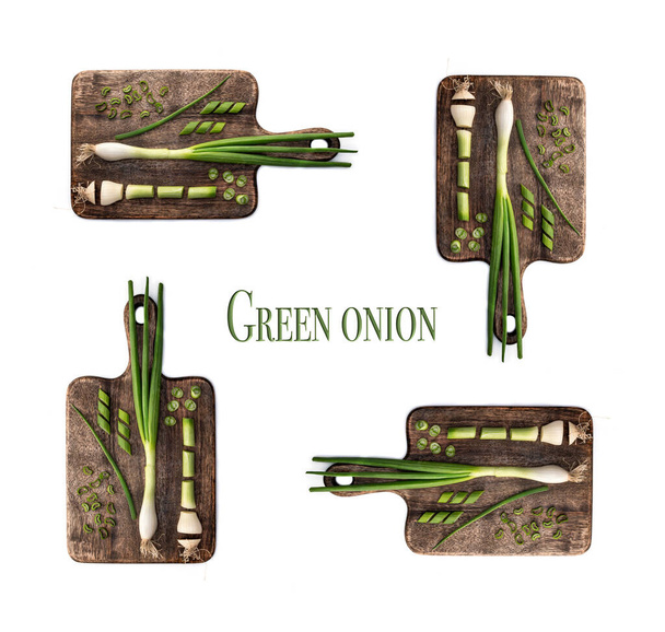 Green onion on four cutting boards. Knolling concept isolated on white background with title: green onion. - Photo, Image