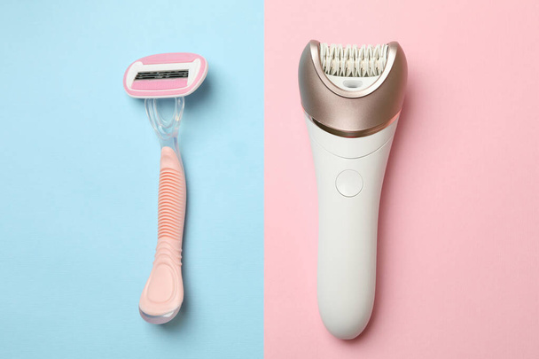 Epilator and razor on two tone background, space for text - Фото, изображение