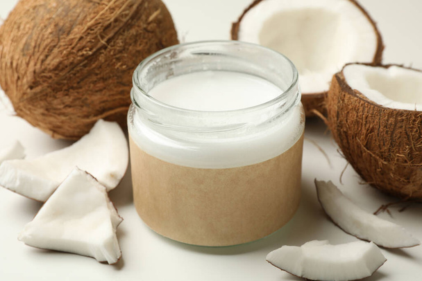 Fresh coconut and coconut milk on white background - Zdjęcie, obraz