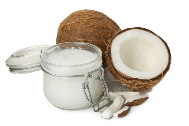 Coconut and jar of coconut milk isolated on white background - Fotoğraf, Görsel