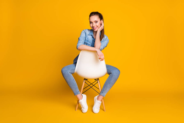 Full body photo of nice attractive girl sit chair enjoy rest relax wear good look outfit gumshoes isolated over vivid color background - Φωτογραφία, εικόνα