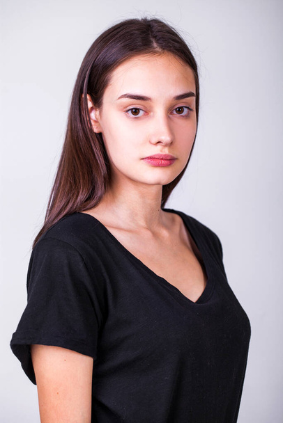 Portrait of a young beautiful brunette girl, indoor - Foto, Imagem