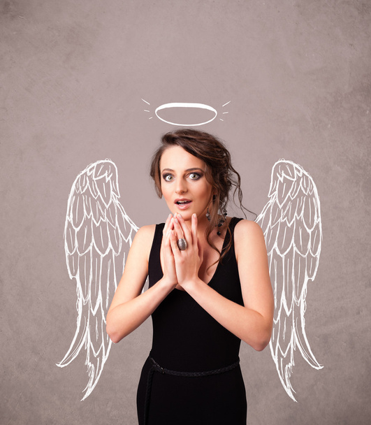 Cute girl with angel illustrated wings - Photo, Image