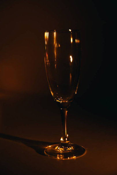 silhouette of a champagne glass on a dark background - Zdjęcie, obraz