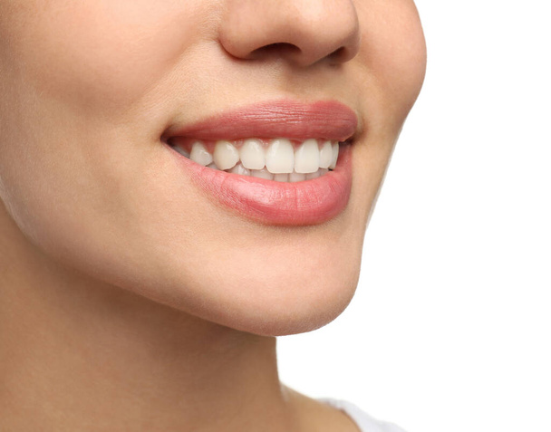 Woman with healthy teeth and beautiful smile on white background, closeup. Cosmetic dentistry - Foto, Imagem