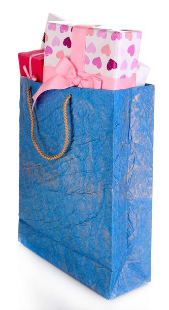 Presents in paper bag isolated on white - Φωτογραφία, εικόνα