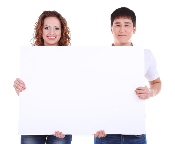 Two beautiful young people holding blank poster isolated on white - Zdjęcie, obraz