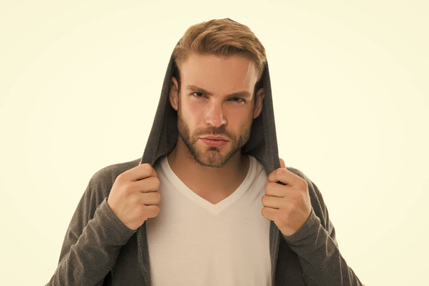 Hooded and unshaven. Unshaven guy isolated on white. Unshaven look of young model. Handsome man with unshaven face. Barbershop. Hair salon. Mens grooming habit. Young skin. Skincare - Foto, imagen