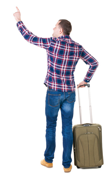 Pointing man with suitcase - Zdjęcie, obraz