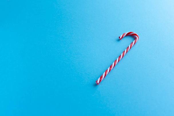 Christmas candy canes and fir branches flat lay - 写真・画像