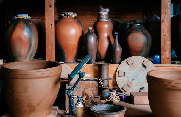 Okinawa style Ceramic clay pottery art, Ceramic vase with pottery making tools - Photo, Image