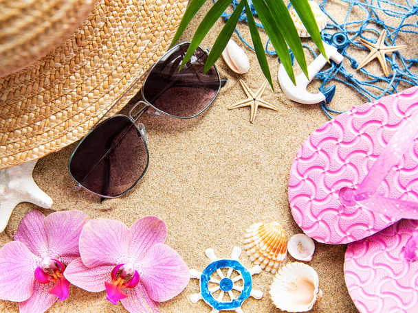 Top view  of beach accesories on sands with copy space - Photo, Image