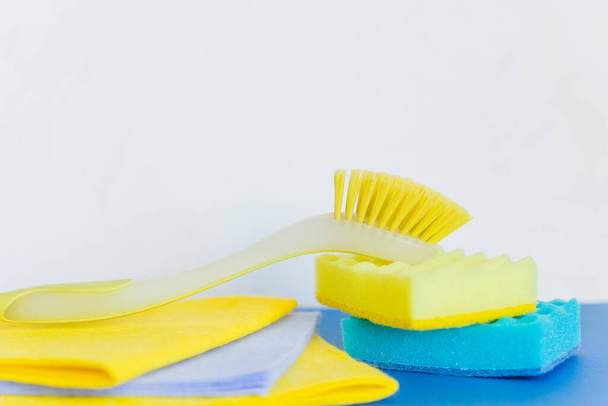 Composition of isolated tools for cleaning houses on white background. Dirt and dust for housework. Chemistry, sprayers and fabric materials.home and office cleaning products.Household chores concept. - Foto, immagini