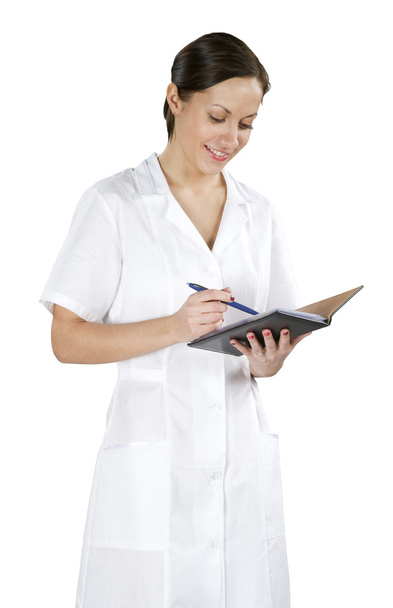 young woman doctor with notepad - Photo, Image