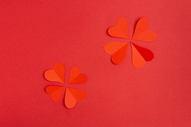 A beautiful red Valentine's day card with red paper hearts - Photo, image