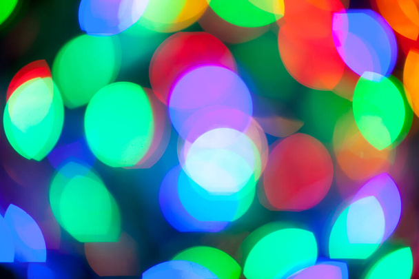 bokeh texture of multicolored christmas and new year lights - Fotoğraf, Görsel