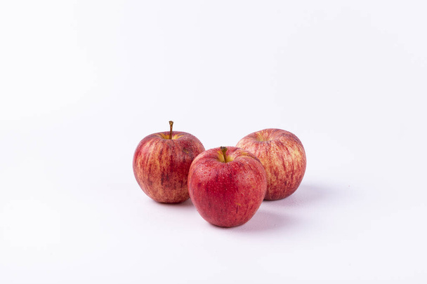 Fresh red apples isolated on a white background - Fotoğraf, Görsel