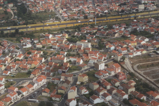An old town cityscape with rural traditional red-tiled buildings - Foto, Bild