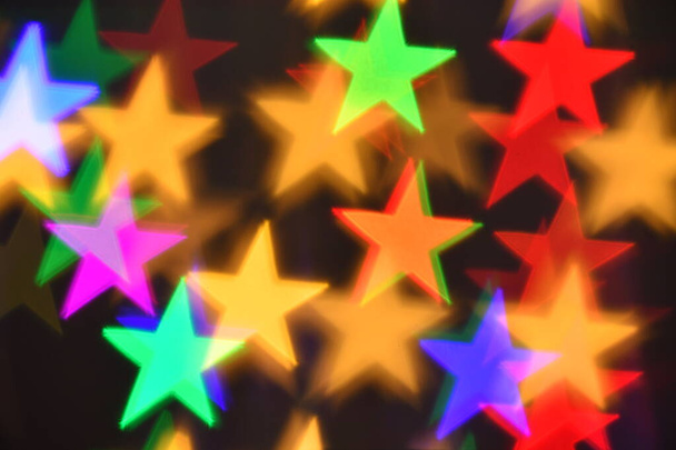 iluminación de estrellas coloridas para vacaciones o fondo boke abstracto - Foto, Imagen