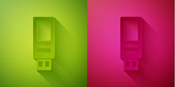 Paper cut USB flash drive icon isolated on green and pink background. Paper art style. Vector. - Vector, Image