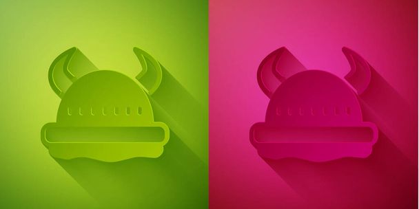 Paper cut Viking in horned helmet icon isolated on green and pink background. Paper art style. Vector. - Vector, Image