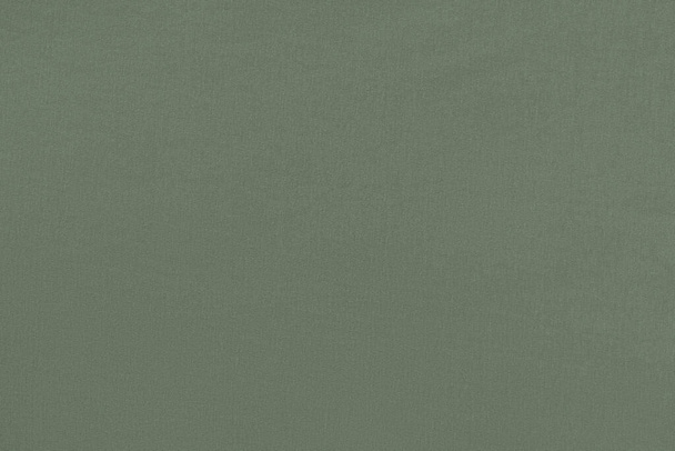 Olive homogeneous background with a textured surface, fabric. - Foto, Bild