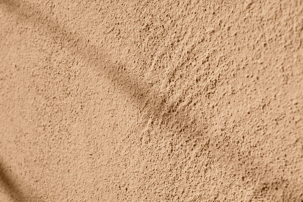 Абстрактний природний фон тіні на текстурі коричневих бетонних стін для фону та шпалер
. - Фото, зображення