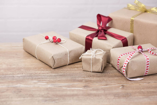 Christmas background with gift boxes  on wooden background - Photo, Image