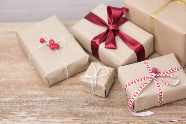 Christmas background with gift boxes  on wooden background - Φωτογραφία, εικόνα