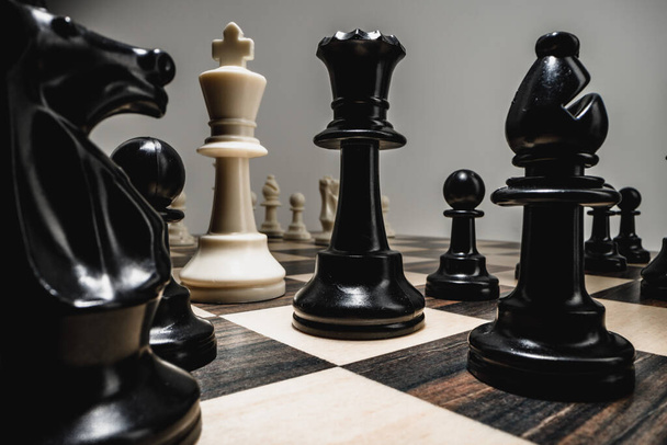 Chess figures on chess board macro photo - Foto, imagen