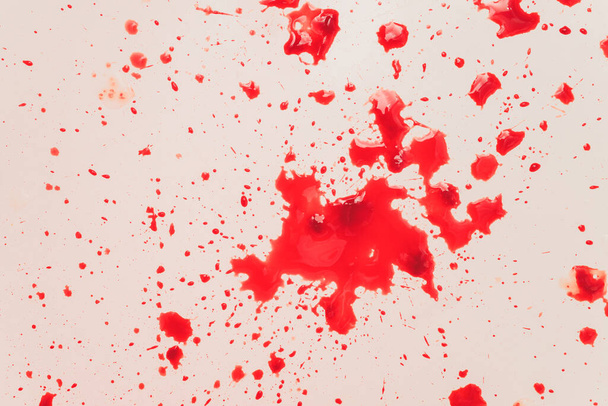 Blood draining from white bathroom basin. Bloody stains in the waterbasin hole. - Photo, image