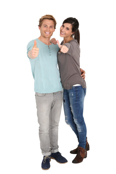 Couple showing thumbs up - Foto, imagen