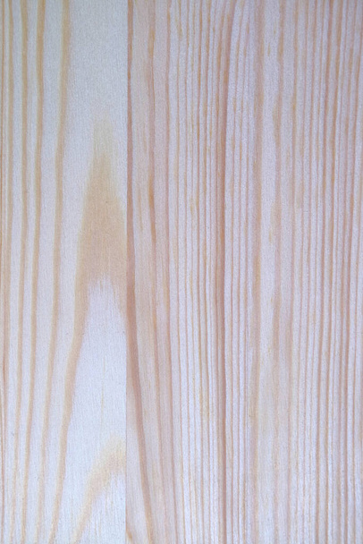 ライトブラウンの木製ドアの垂直ストライプパターン、背景 - 写真・画像