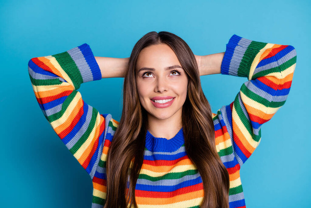 Close-up portrait of her she nice attractive lovely cheerful brown-haired girl wearing casual sweater looking up creating solution isolated bright vivid shine vibrant blue color background - Foto, imagen
