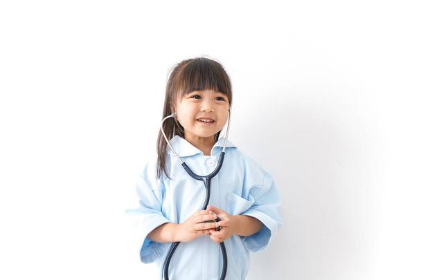Lindos niños médico aislado sobre fondo blanco - Foto, Imagen