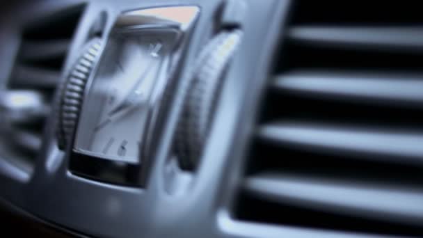 Clock on dashboard in a luxury car. Luxury car interior. 4K video - Footage, Video