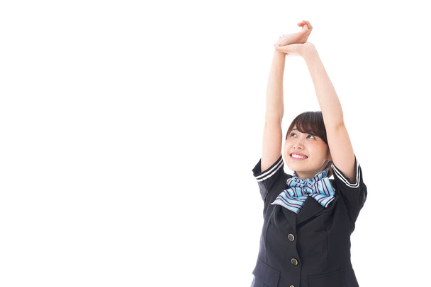 Asiatico hostess alzando mano su isolato su sfondo bianco  - Foto, immagini