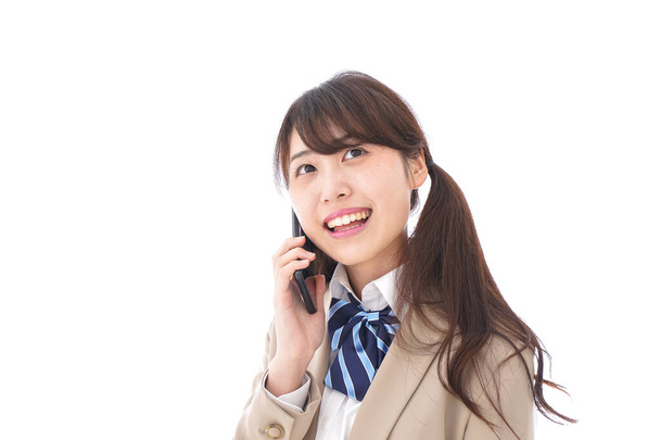 Kobieta azjatycki student rozmawia przez telefon - Zdjęcie, obraz