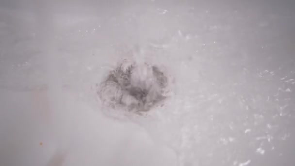 Drain Hole in Sink is Clogged. Bubbling Water Pours Into a Clogged White Sink - Footage, Video