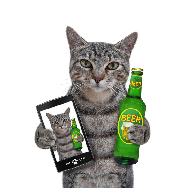 A gray cat with a bottle of beer takes selfie. White background. Isolated. - Fotografie, Obrázek