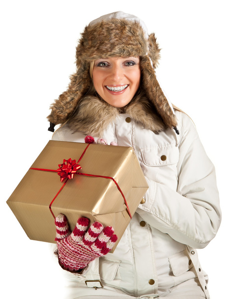 Caucasian blond woman in furry hat and christmas gifts isolated on white - Fotoğraf, Görsel