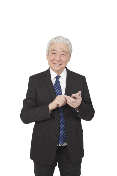 Senior businessman using smart phone - Fotografie, Obrázek