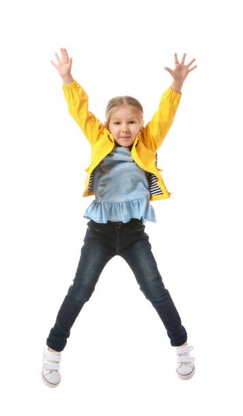 Jumping little girl on white background - Foto, immagini