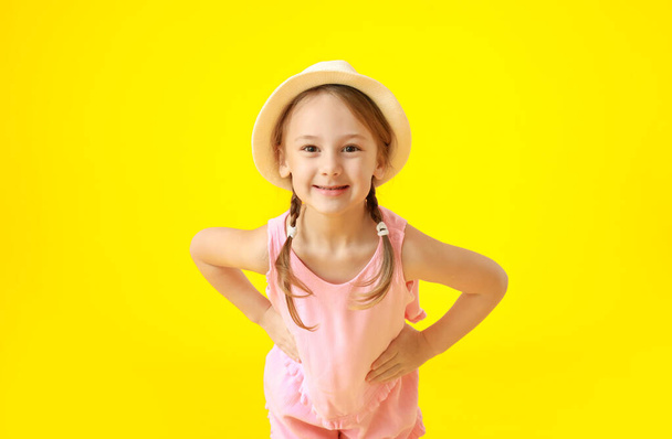 Portrait of stylish little girl on color background - Photo, Image