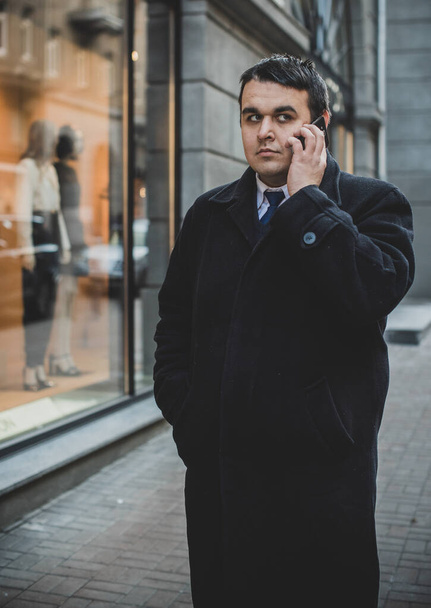 Worried man at city streets. Life of businessman or manager, office worker. Plump guy at center in sad mood - Fotoğraf, Görsel