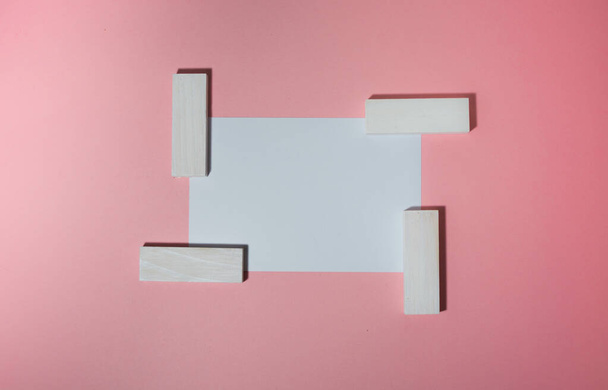 Postcard on a pink background with a pattern of blocks. - Valokuva, kuva