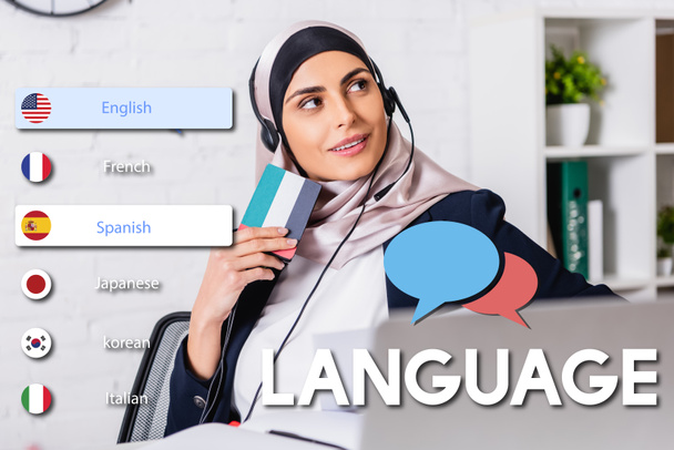 smiling arabian interpreter in headset holding digital translator on blurred foreground, speech bubbles near icons with different languages illustration - Foto, imagen