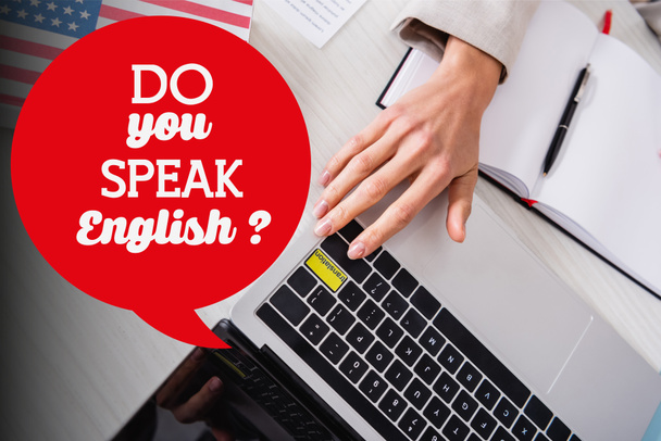 partial view of interpreter pressing key with translation lettering, speech bubble with do you speak english question illustration - Photo, Image